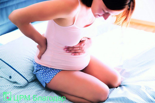 Біль у спині і вагітність фото